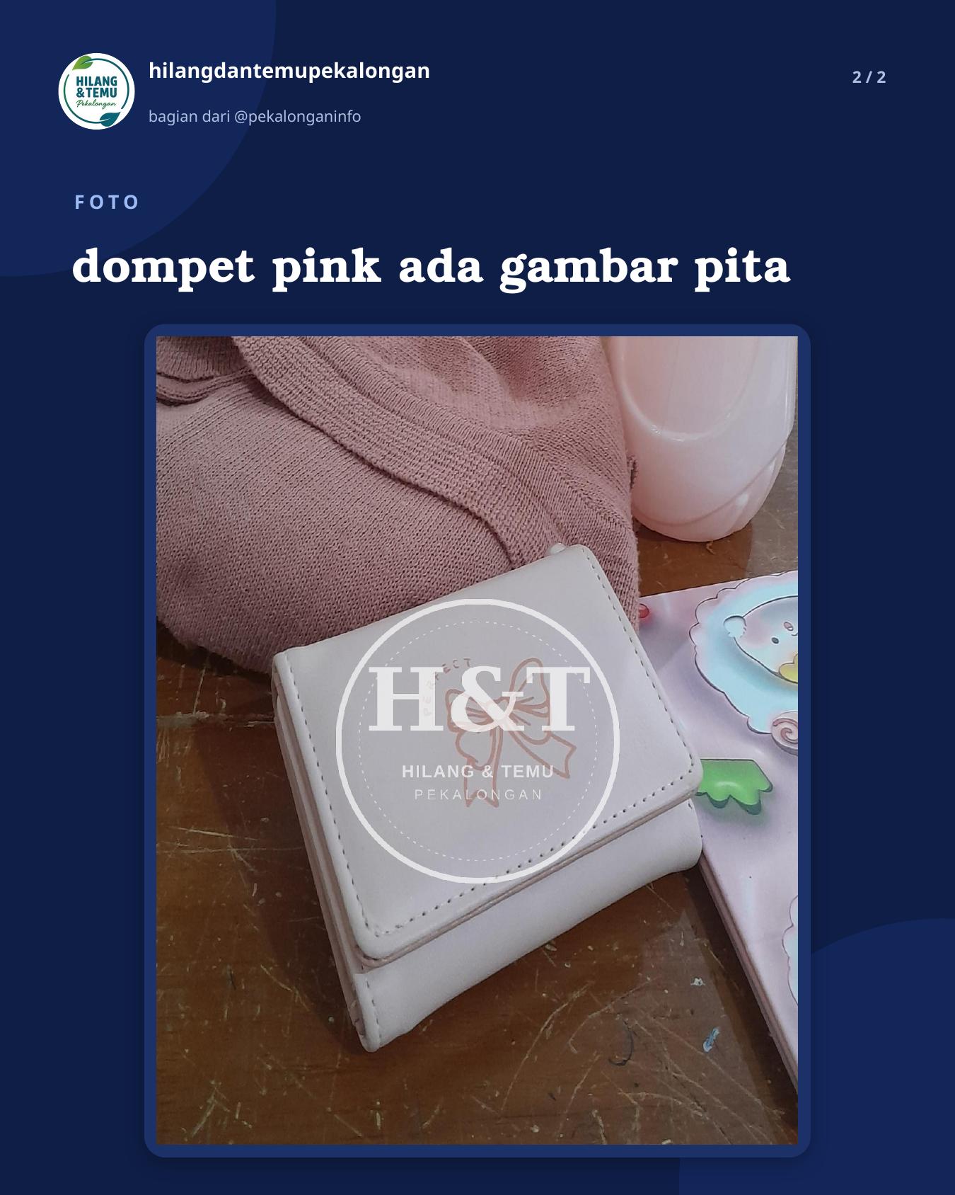 Slide 2 laporan dompet pink ada gambar pita
