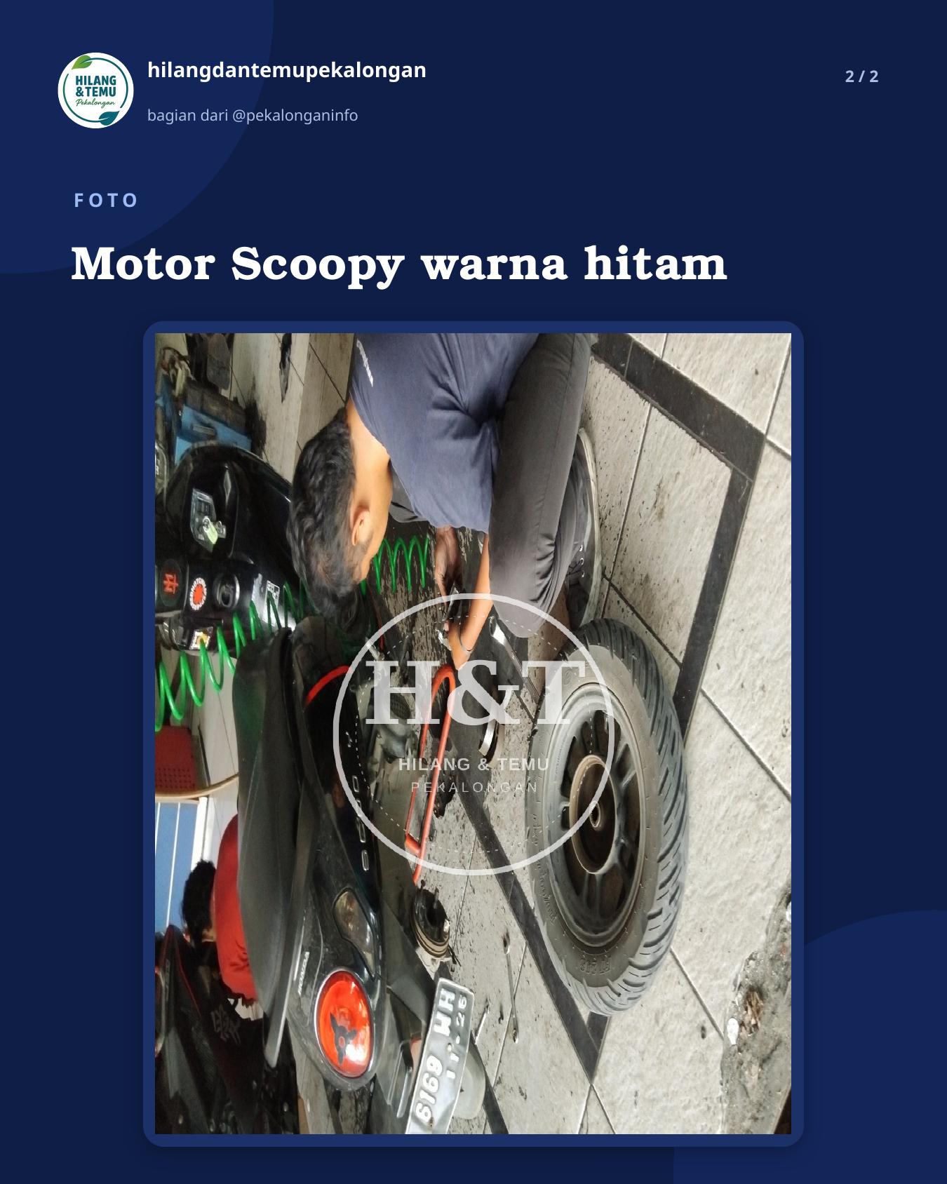 Slide 2 laporan Motor Scoopy warna hitam