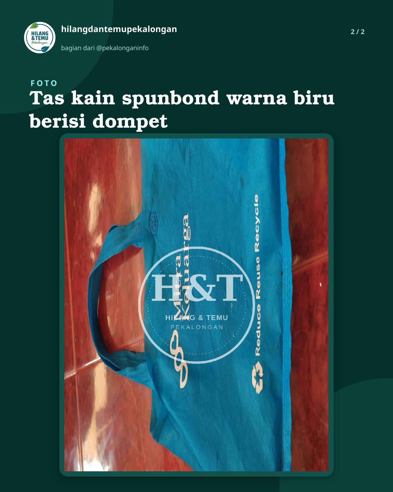 Slide 2 laporan Tas kain spunbond warna biru berisi dompet