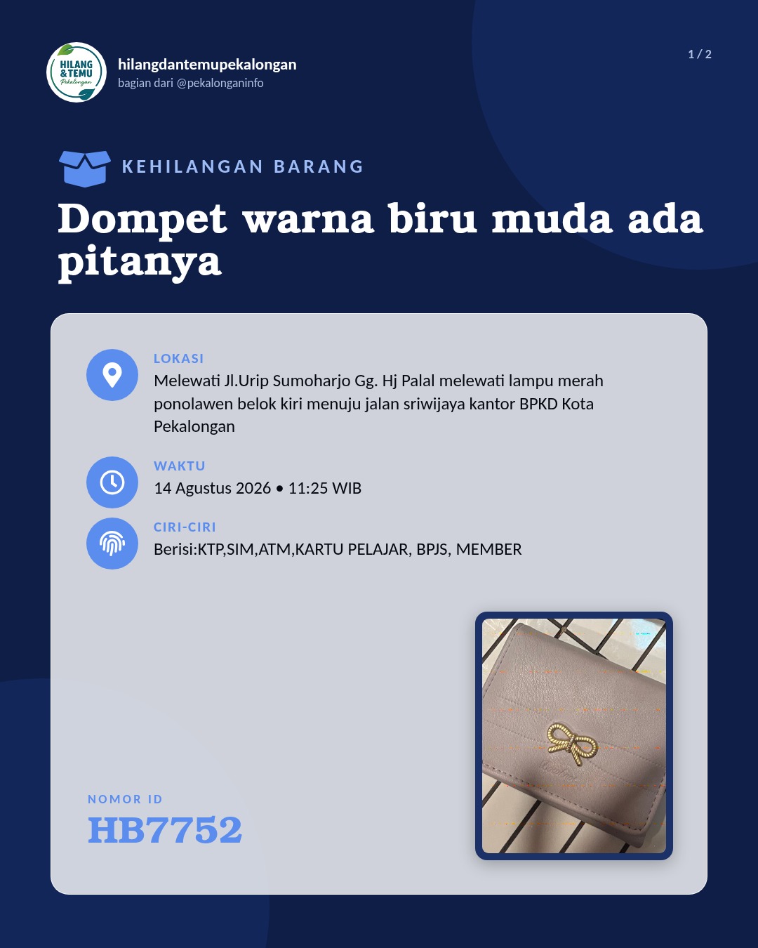 Slide 1 laporan Dompet warna biru muda ada pitanya