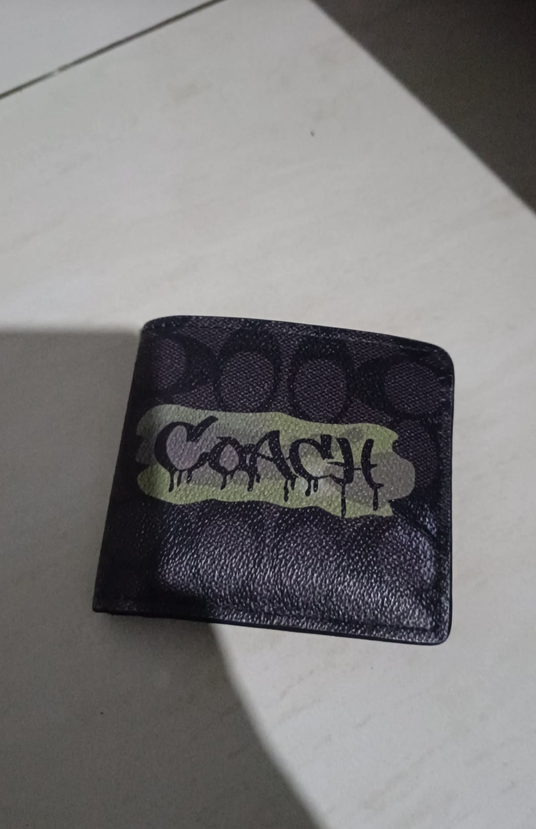 Foto laporan dompet warna hitam (TB1554)