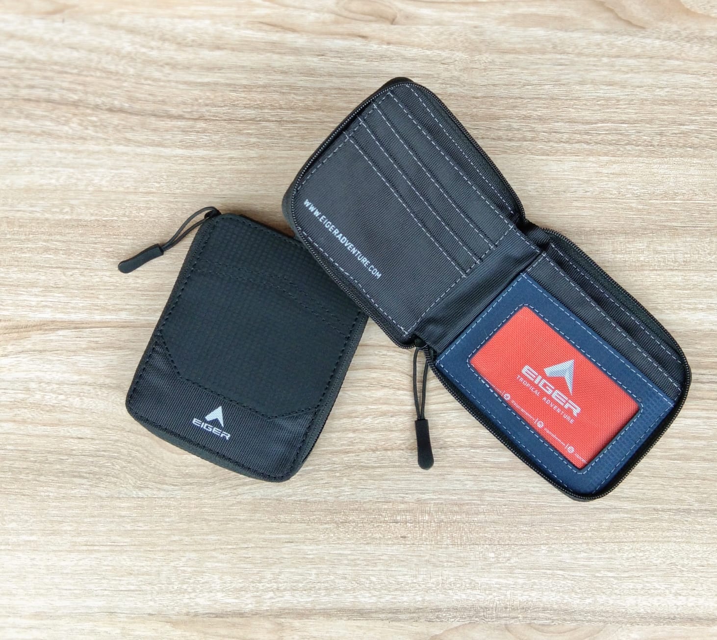 Foto laporan Dompet eiger zipper warma hitam (HB7794)