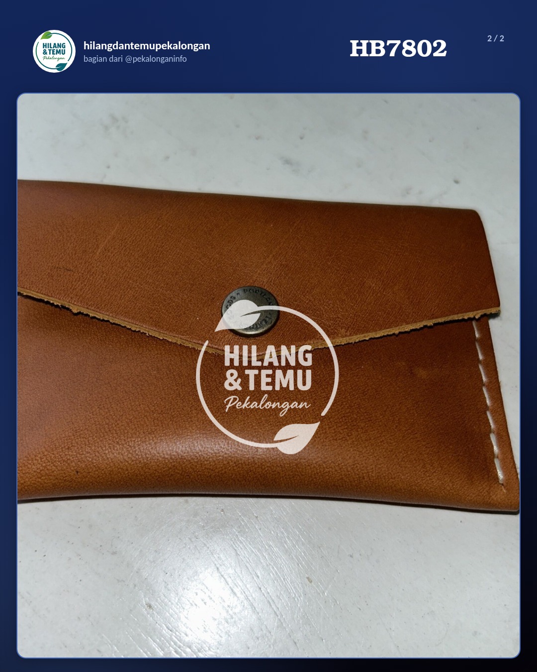 Slide 2 laporan Dompet berwarna coklat