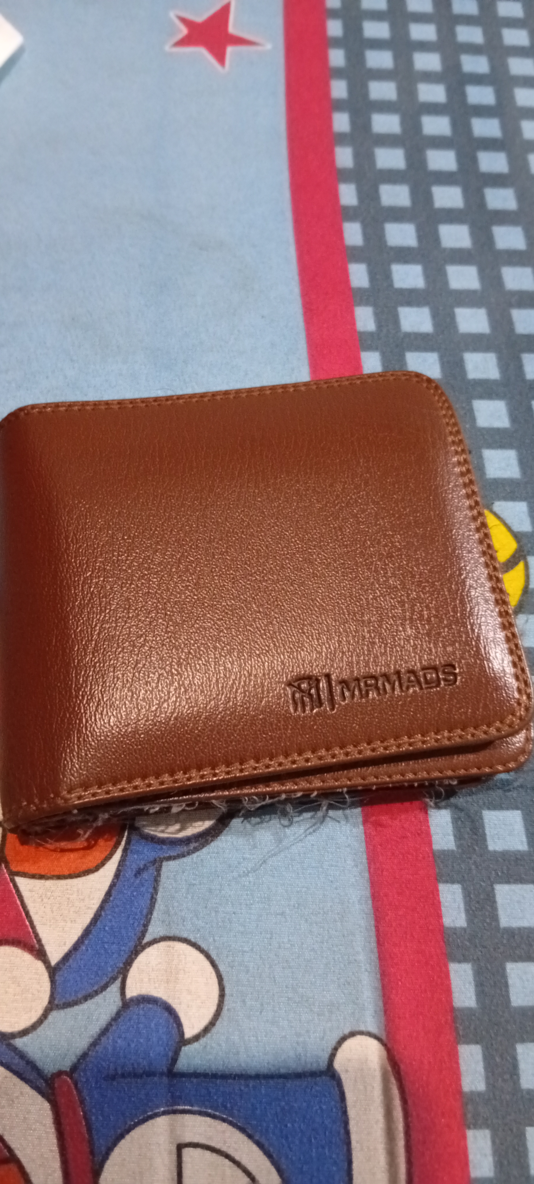 Foto laporan Dompet warna coklat (TB1561)