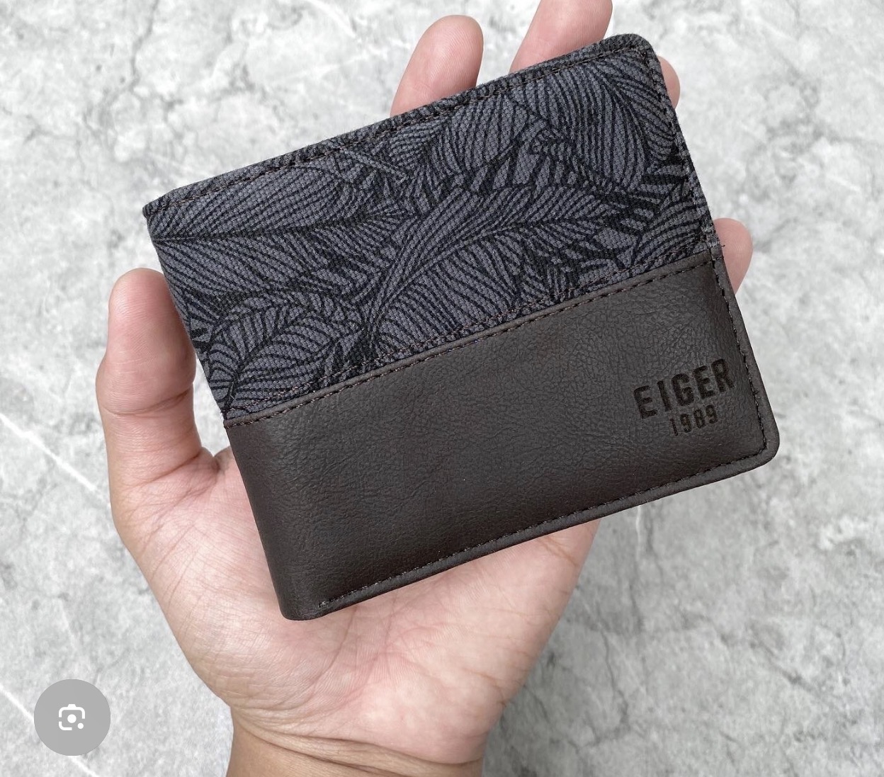 Foto laporan Dompet nya eiger batik setengah bawah nya warna coklat (HB7852)