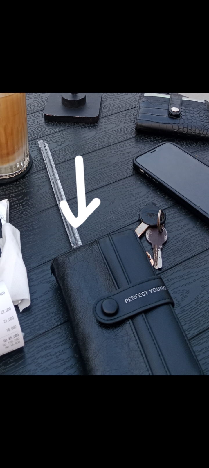 Foto laporan Dompet warna hitam (HB7875)