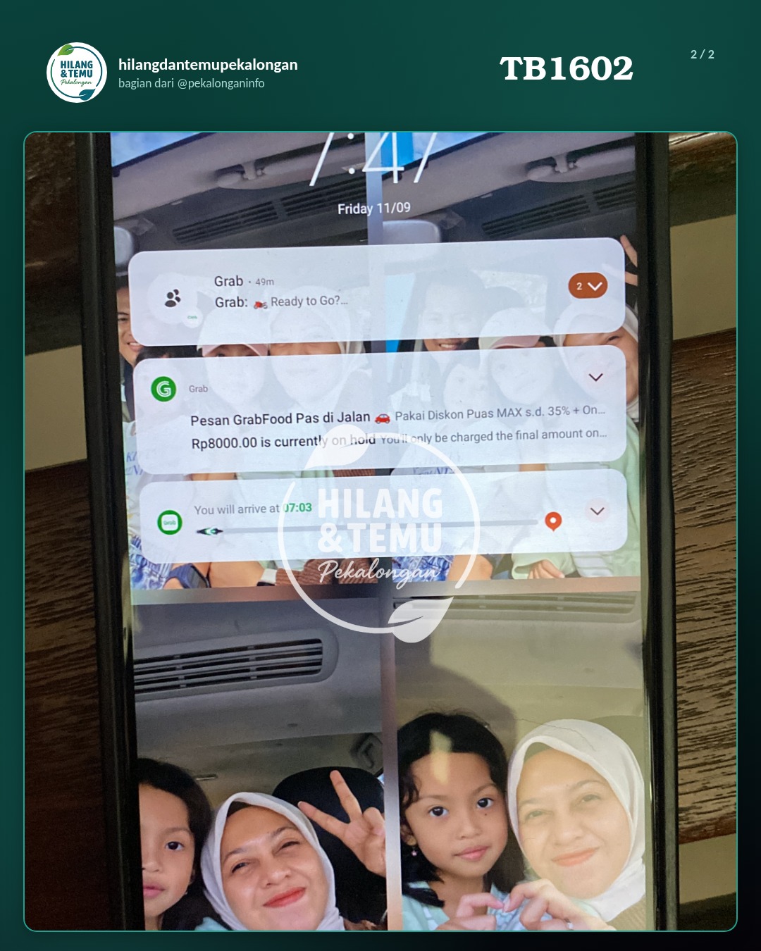 Slide 2 laporan Handphone Hitam