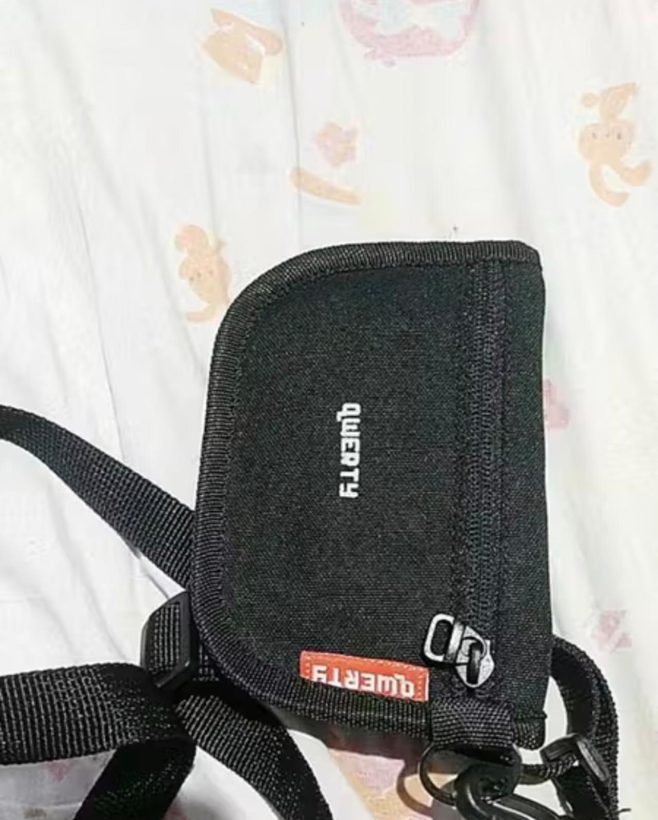 Foto laporan Dompet warna hitam (HB7977)