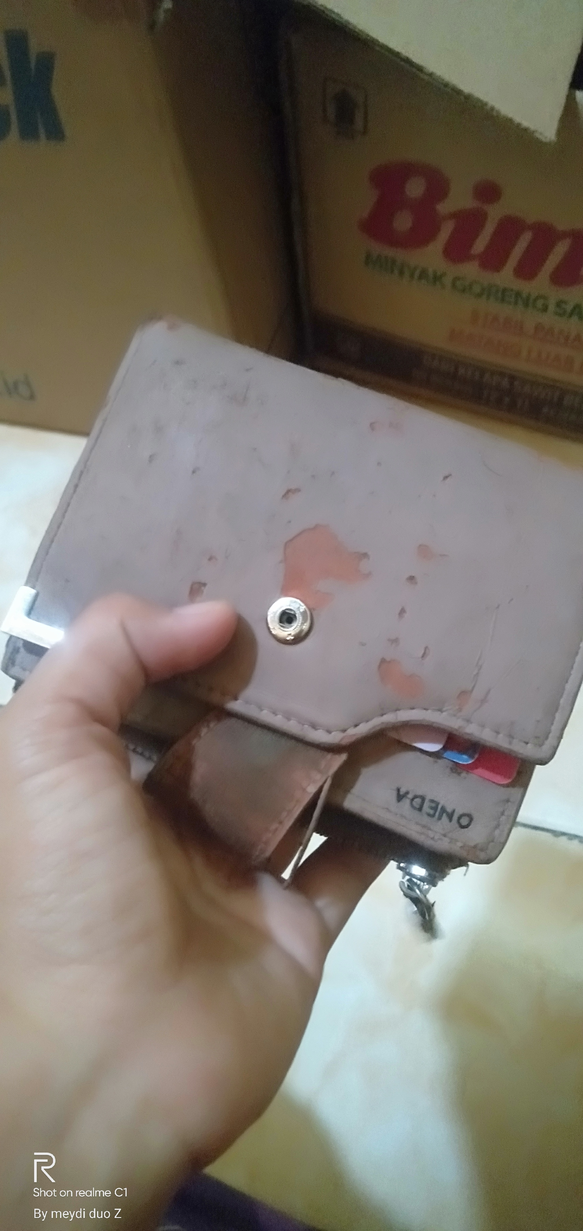Foto laporan Dompet warna coklat ,isi kartu kartu dan uang (TB1616)