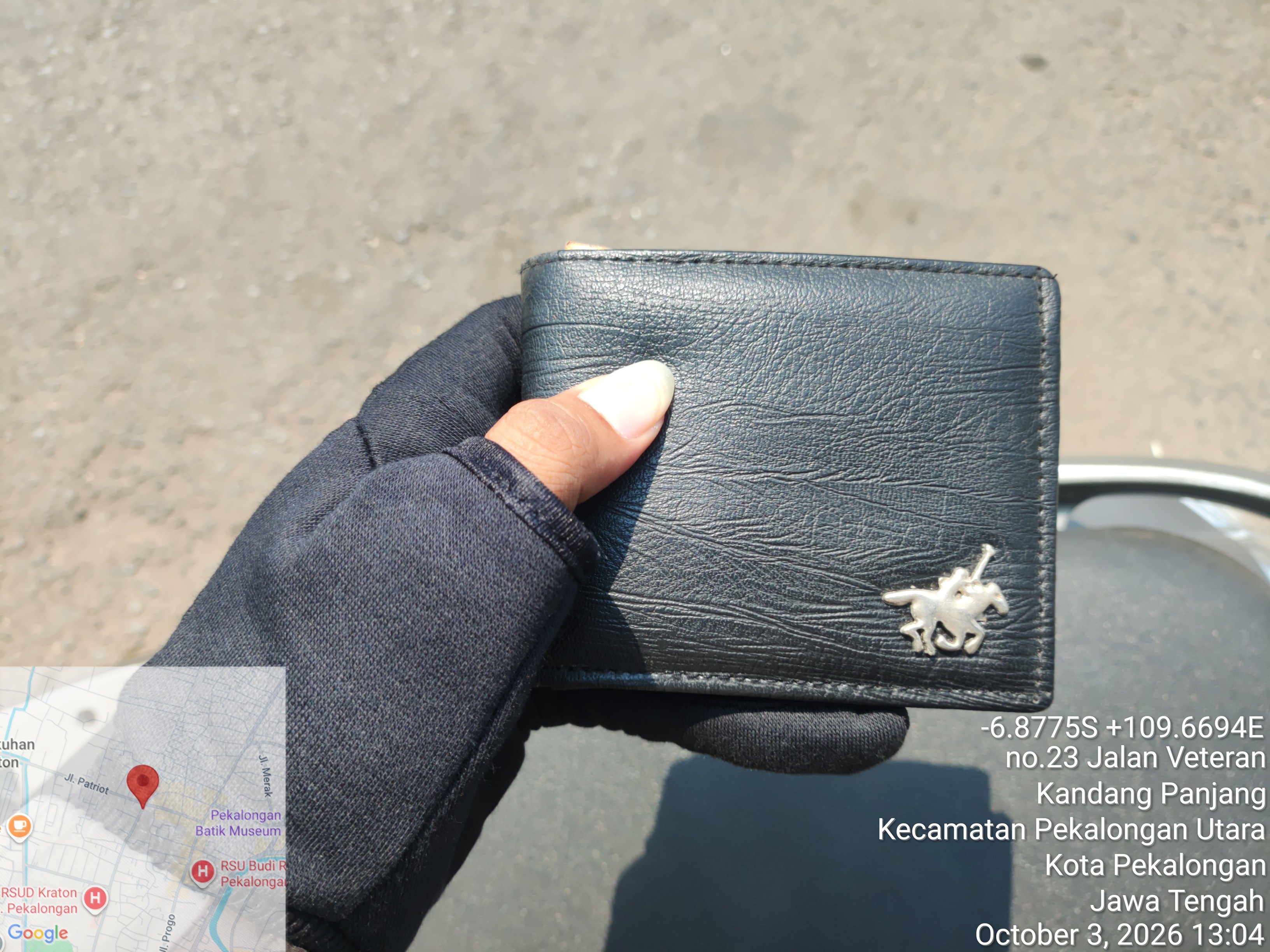 Foto laporan Dompet warna hitam (TB1630)