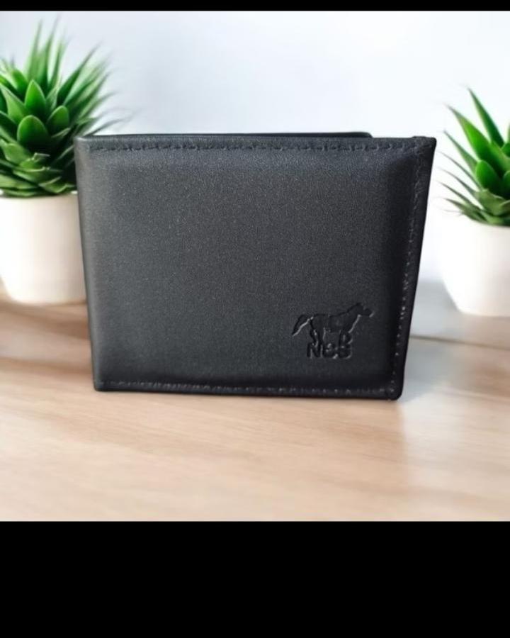 Foto laporan Dompet Warna Hitam (HB7701)