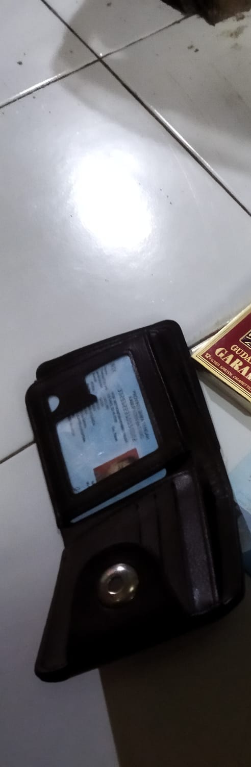 Foto laporan Dompet coklat (HB0278)