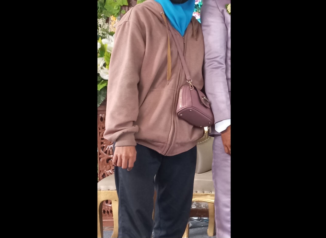 Foto laporan Barang hilang berupa tas slempang beserta isinya (HB0690)