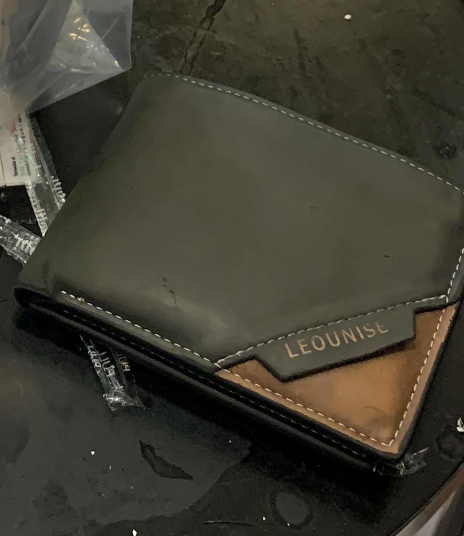 Foto laporan Dompet yang isinya KTP,SIM,STNK motor dan kartu pelajar (HB0939)