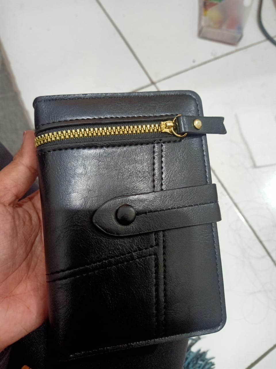 Foto laporan Dompet warna hitam (HB1037)