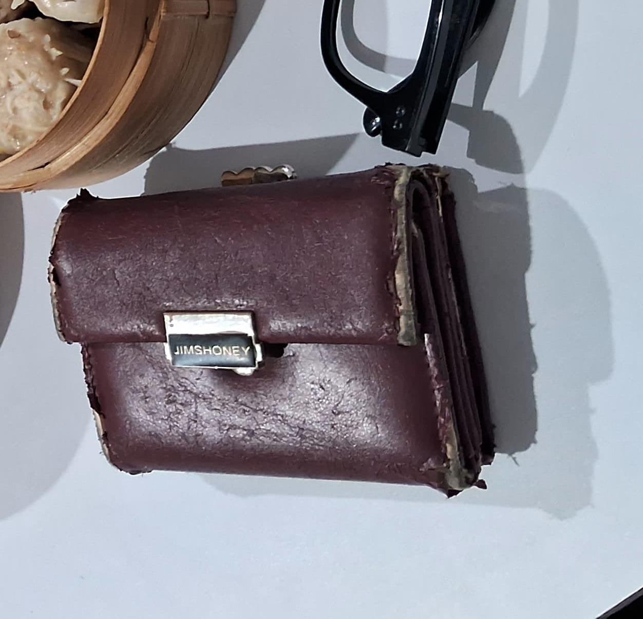 Foto laporan Dompet (HB1054)