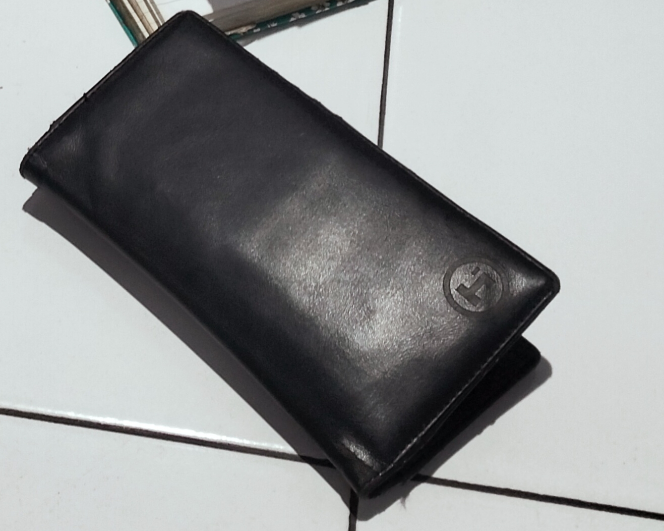 Foto laporan Dompet warna hitam agak panjang (HB1065)