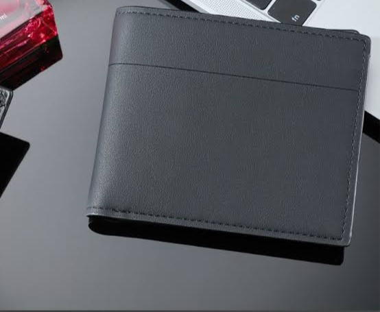 Foto laporan Dompet merk Miniso warna hitam, (HB1244)