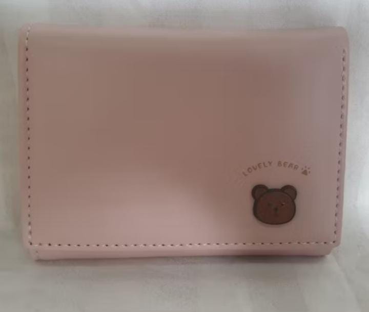 Foto laporan DOMPET warna pink isinya STNK, KTP, KTM, ATM BCA, UANG TUNAI (HB1329)