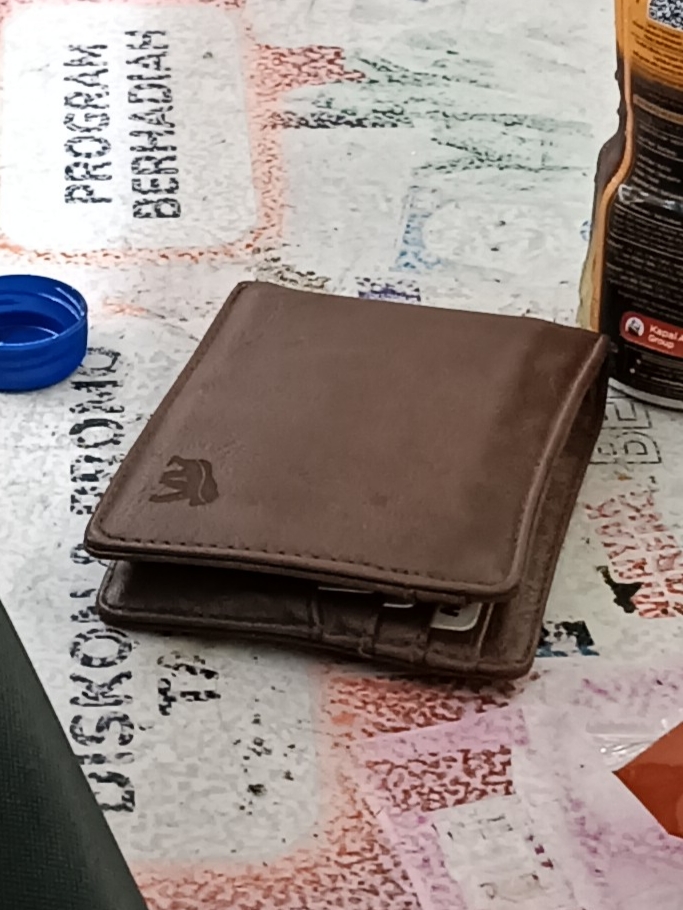 Foto laporan Dompet (HB1434)