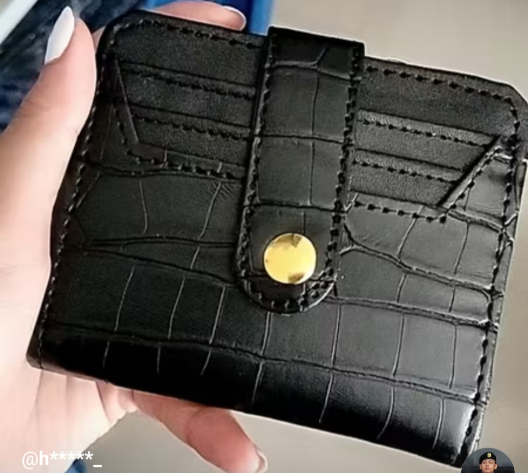 Foto laporan dompet hitam (HB1625)