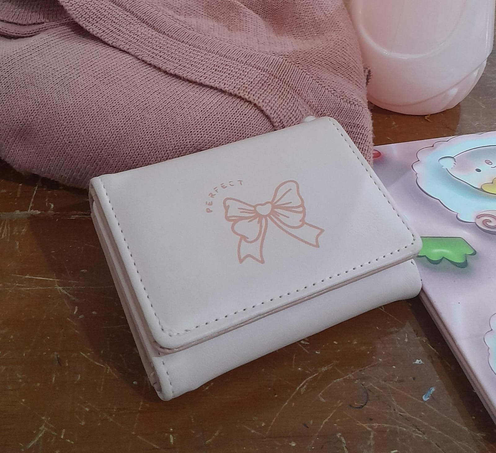 Foto laporan dompet pink ada gambar pita (HB1666)