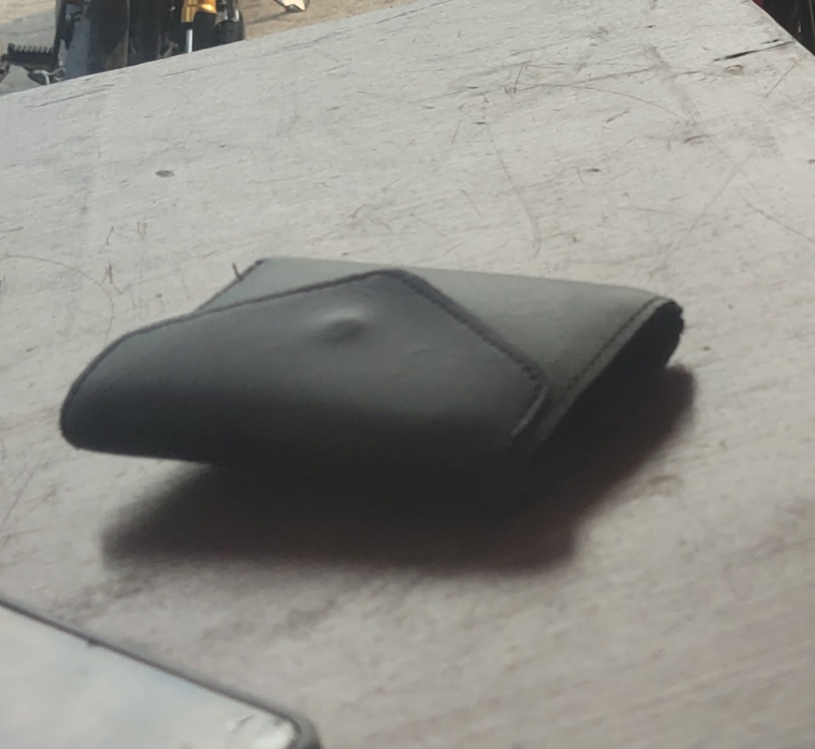 Foto laporan Dompet Hitam (HB1838)