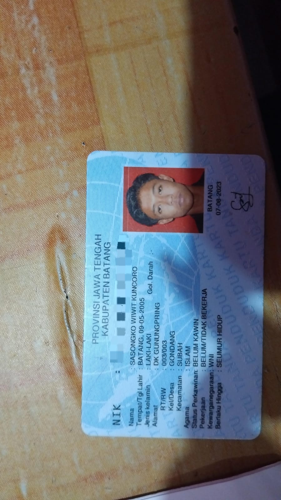 Foto laporan dompet (HB1925)