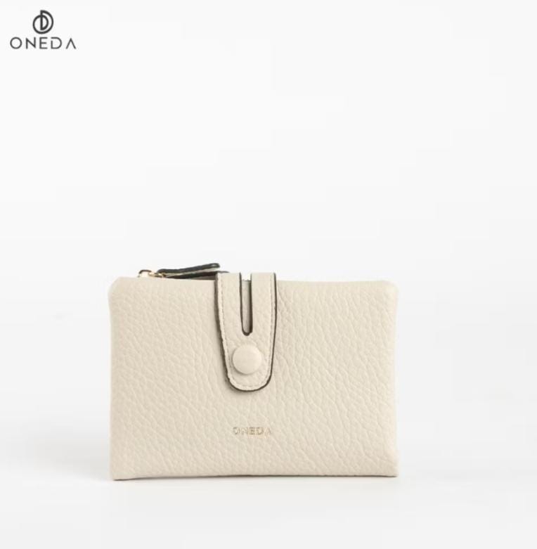 Foto laporan Dompet warna cream (HB2467)