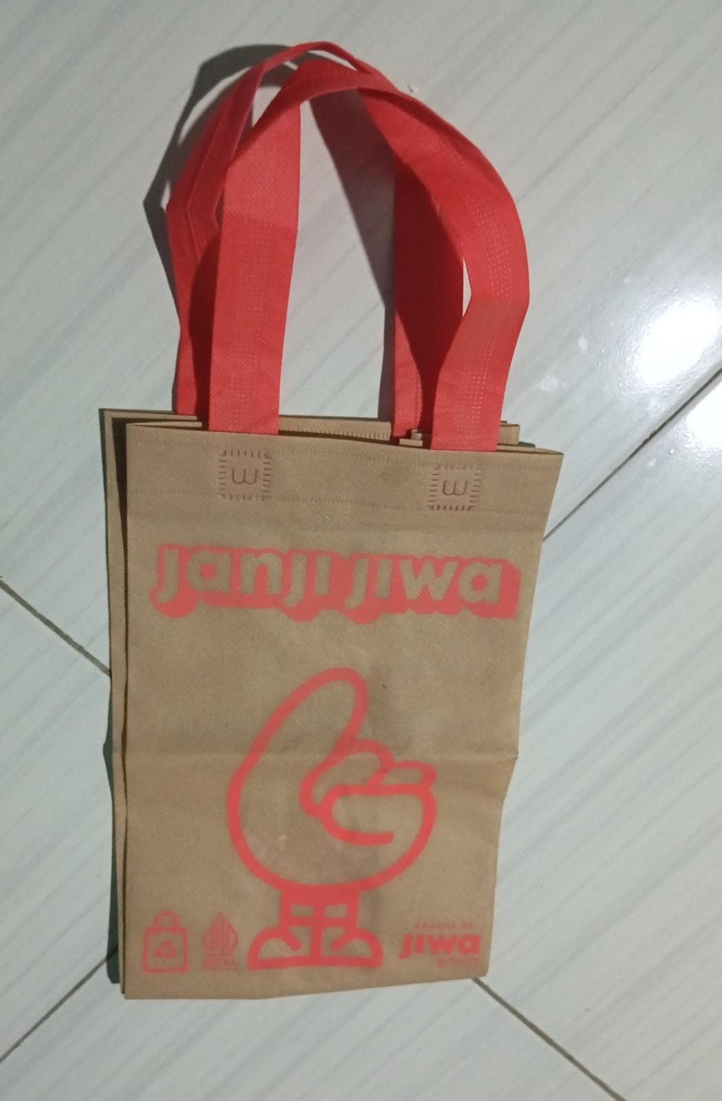 Foto laporan Tas Janji Jiwa, Berisi Mukena, Pakaian, Bakso, Sengkulun dan Petis Kacang (Barang dagangan) (HB2491)