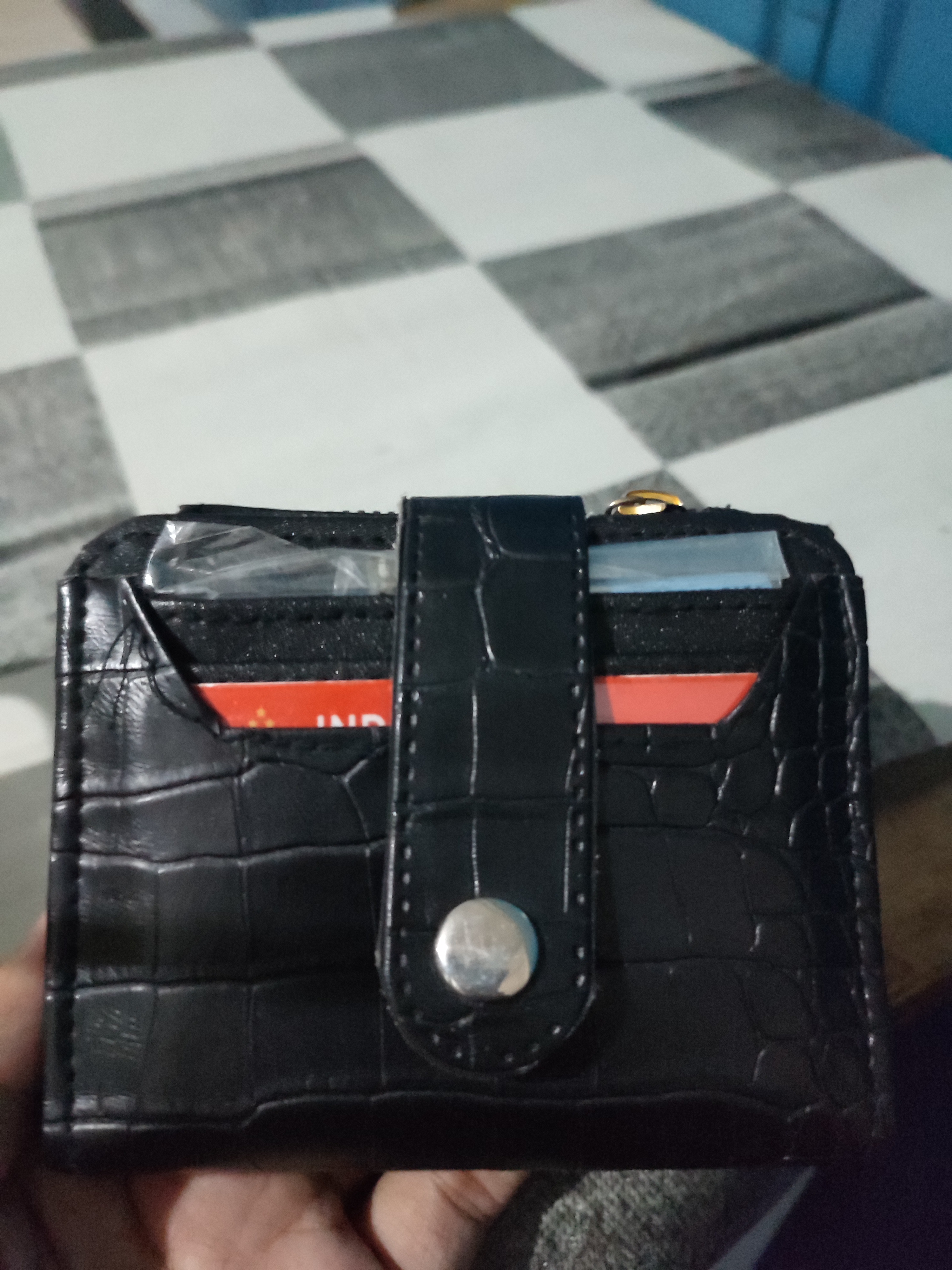 Foto laporan dompet hitam (HB2577)