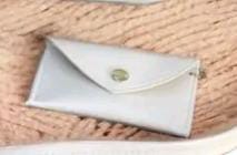 Foto laporan DOMPET WARNA PUTIH (HB2979)