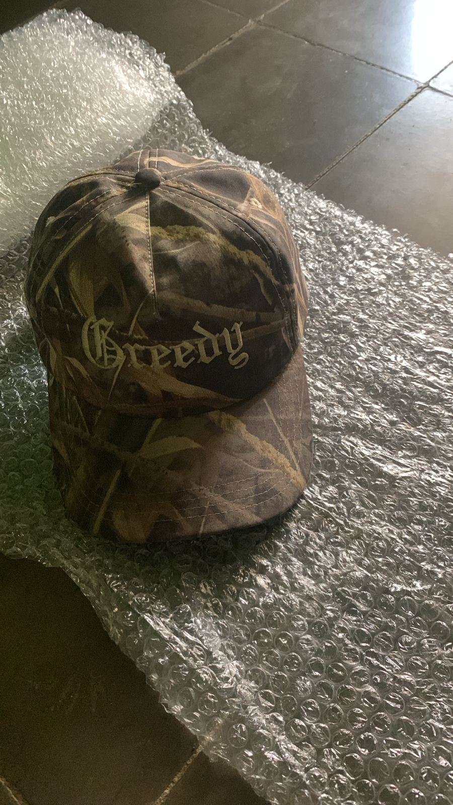 Foto laporan topi motif camo (HB2989)