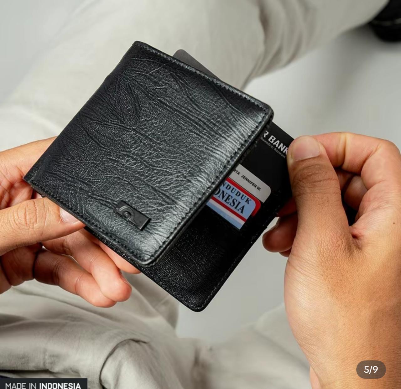 Foto laporan Dompet warna hitam (HB3317)