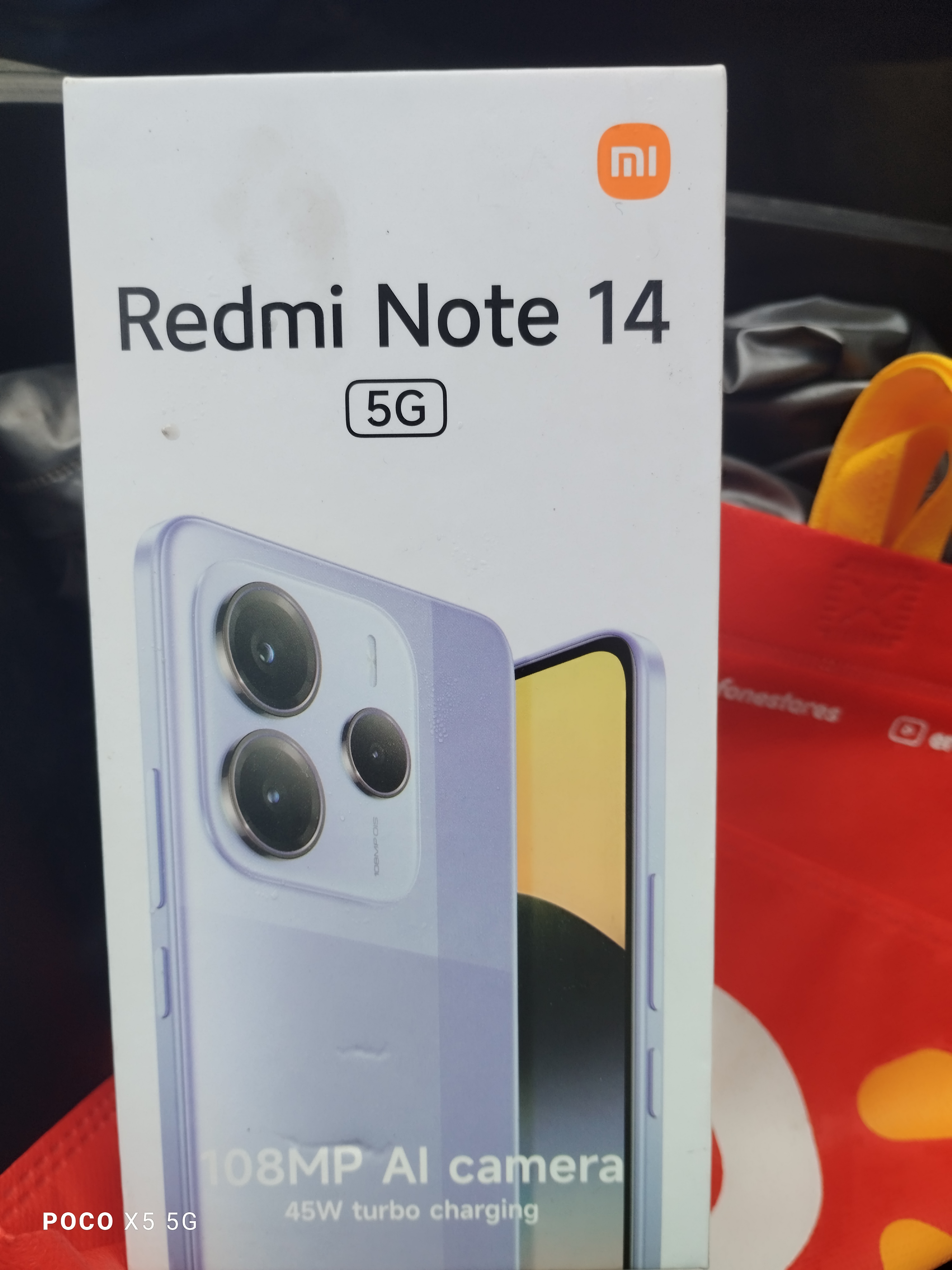 Foto laporan Dompet rajut warna coklat isi Hp xiaomi redmi note 14 (HB3596)