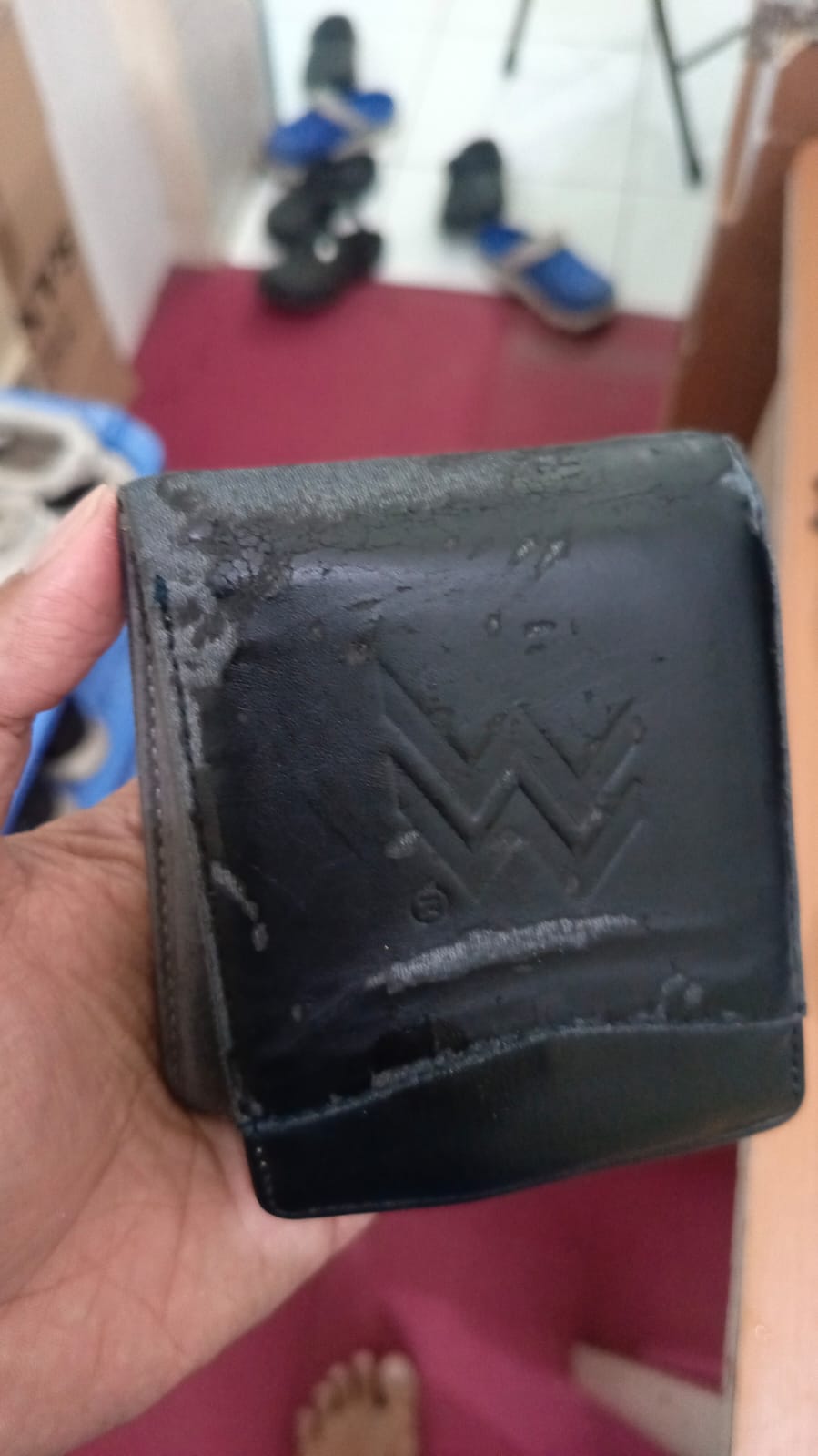Foto laporan Dompet warna hitam (HB3837)