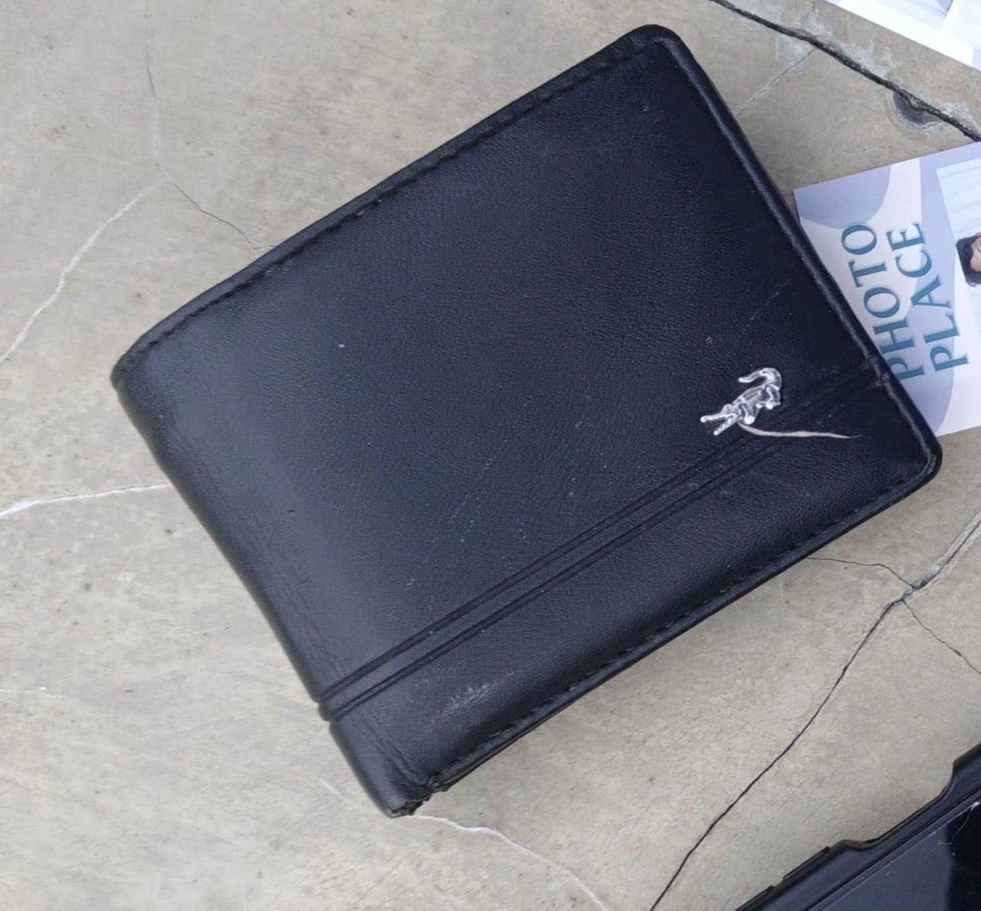 Foto laporan Dompet hitam (HB3981)