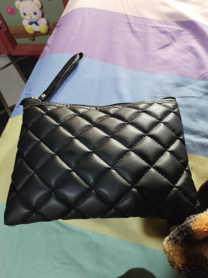 Foto laporan tas dompet warna hitam isi uang KTP STNK (HB3982)