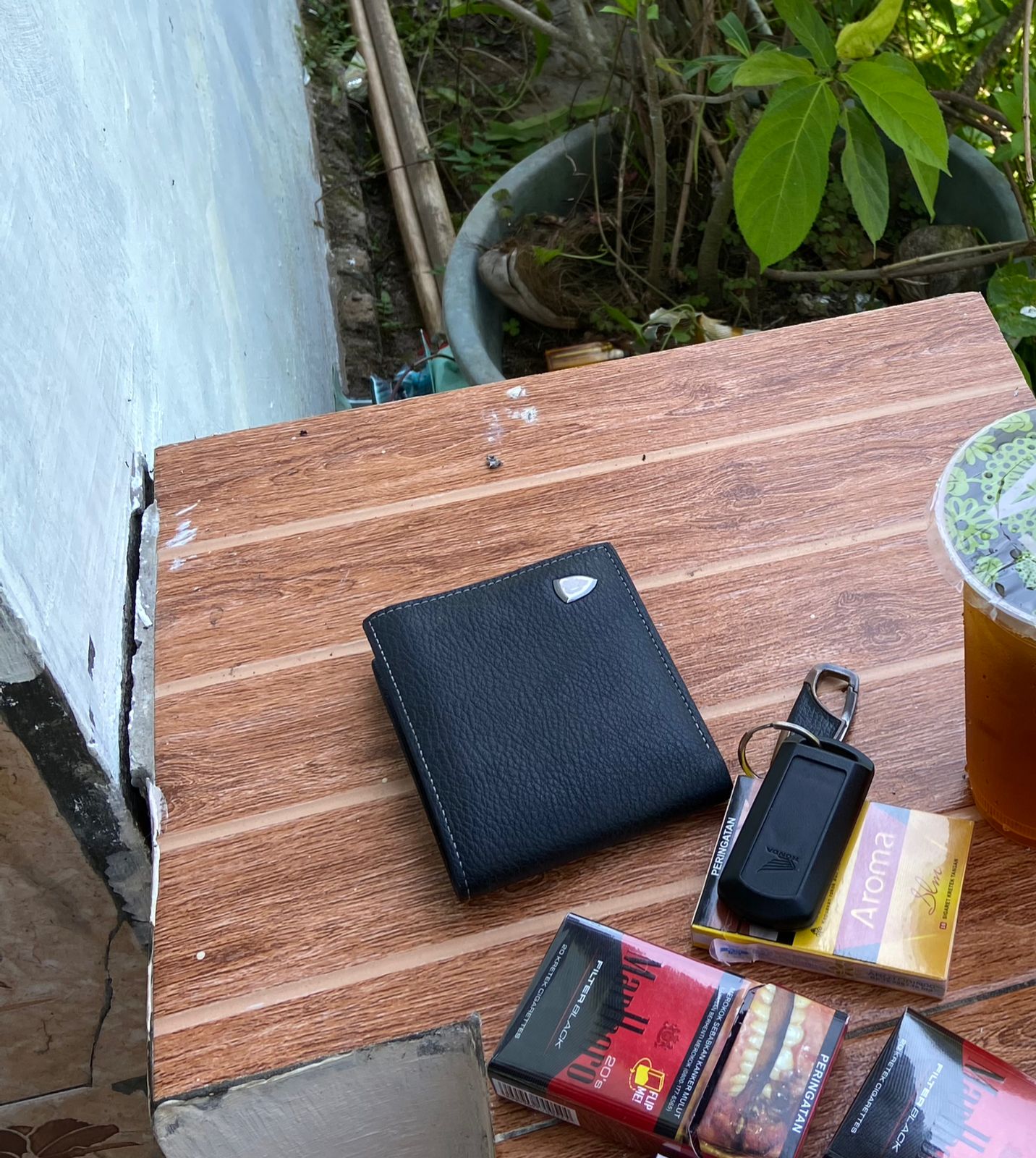 Foto laporan dompet (HB4303)