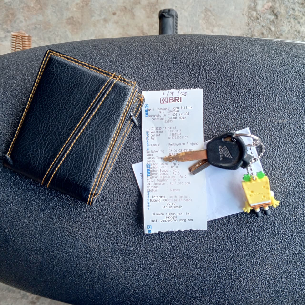 Foto laporan dompet hilang (HB4996)