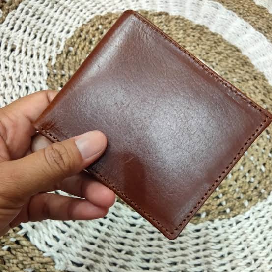 Foto laporan Dompet & Isinya (HB5072)