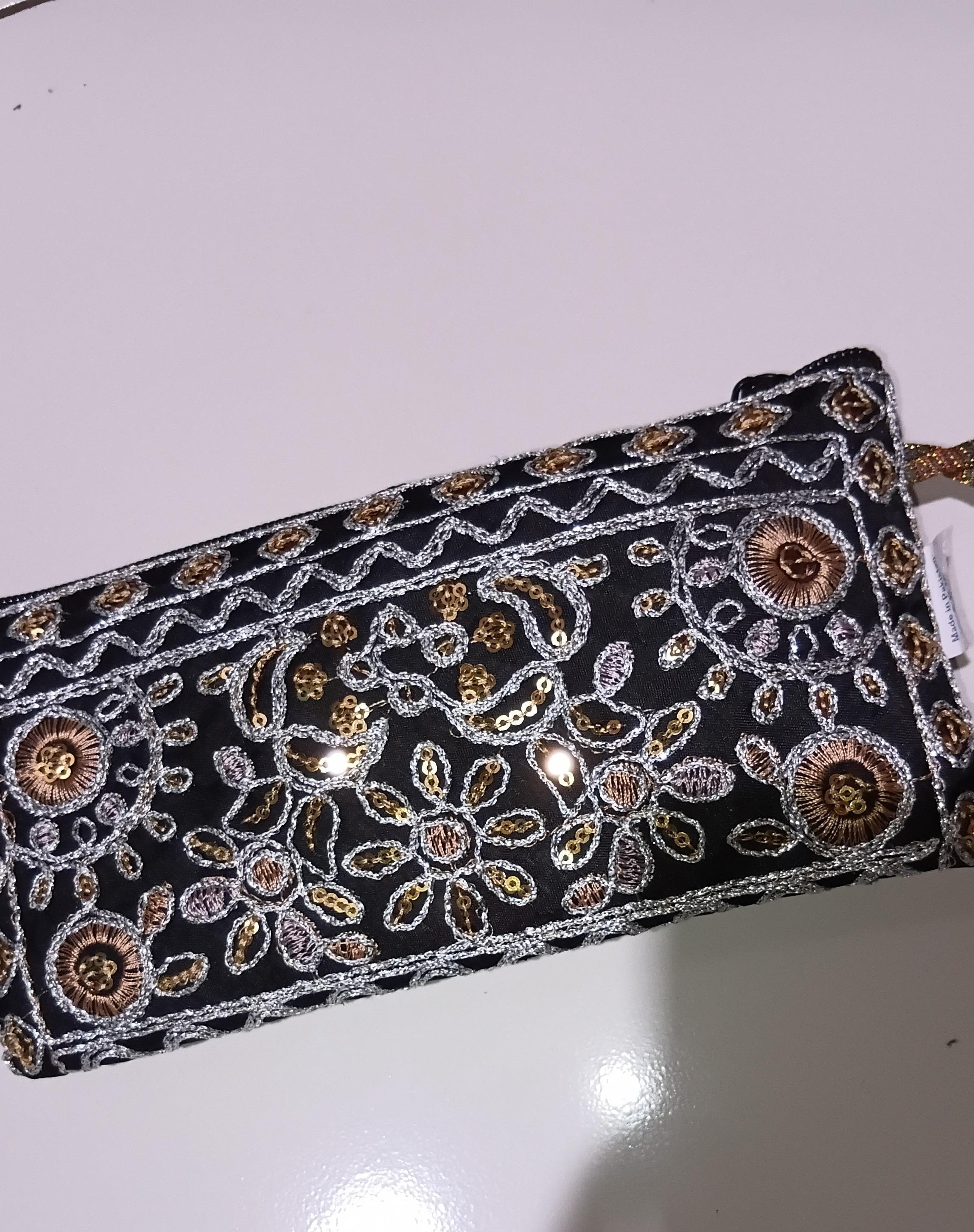 Foto laporan Dompet dan hp Vivo warna merah (HB5431)