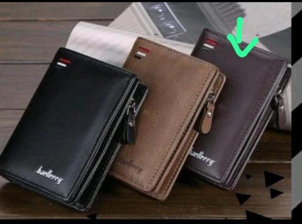 Foto laporan Dompet warna coklat berisi uang sejumlah 1jt 100 ktp. ,sim ,stnk (HB5638)