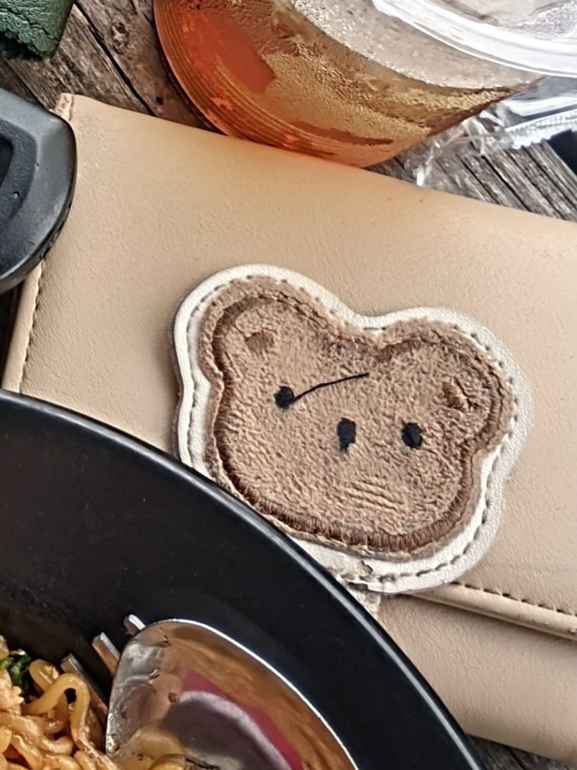Foto laporan Dompet miniso beruang coksu (HB5674)