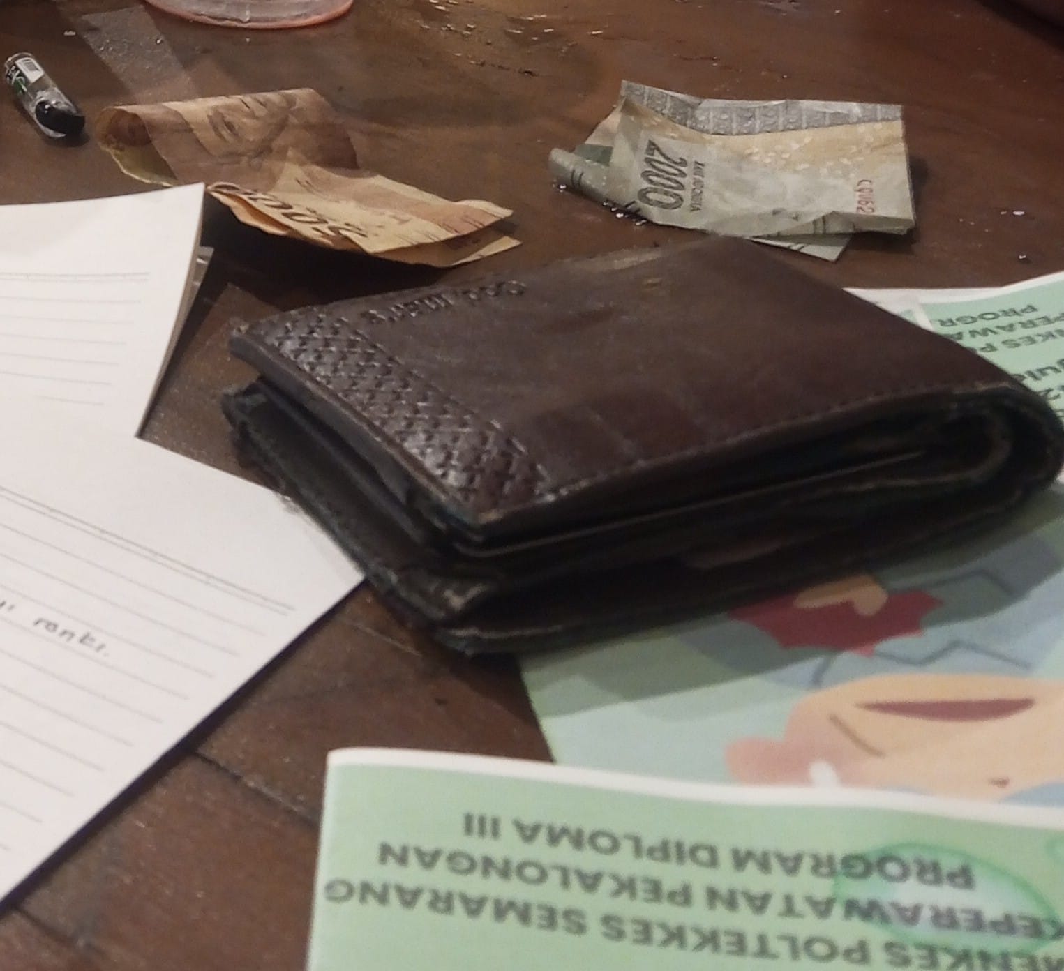 Foto laporan KEHILANGAN DOMPET (HB5689)