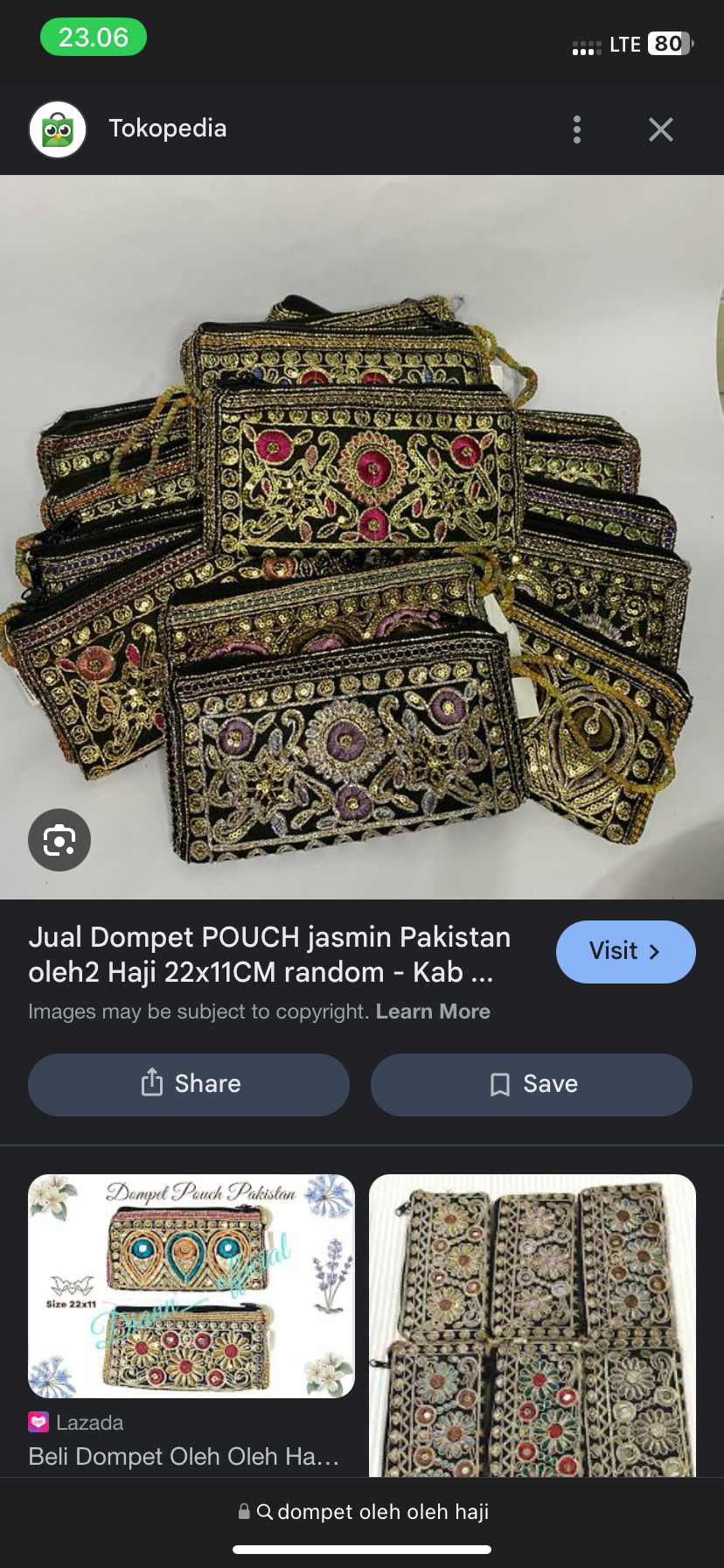 Foto laporan Dompet ibu-ibu warna hitam kelap kelip (dompet oleh oleh kaji) (HB5785)