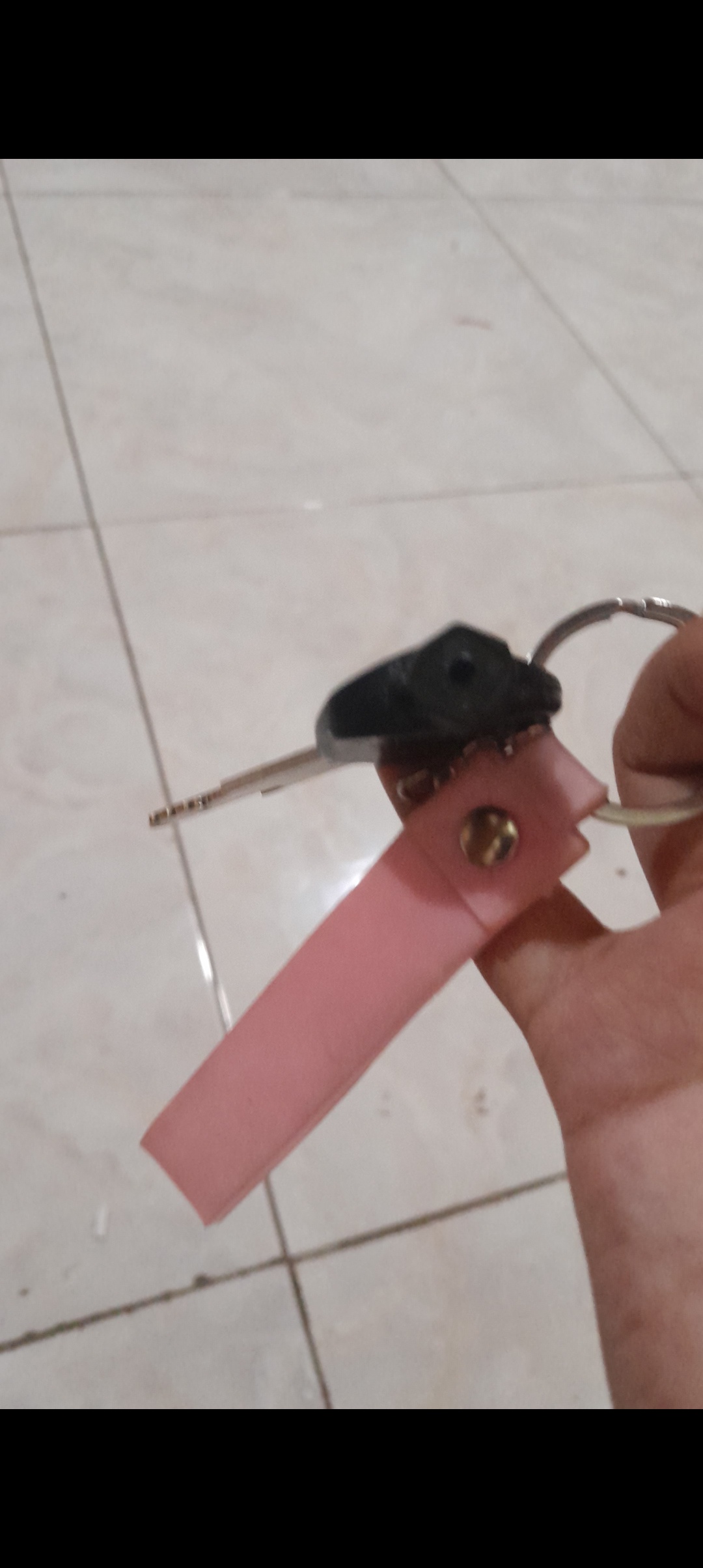 Foto laporan Kunci motor beat gantungan pink (HB5790)