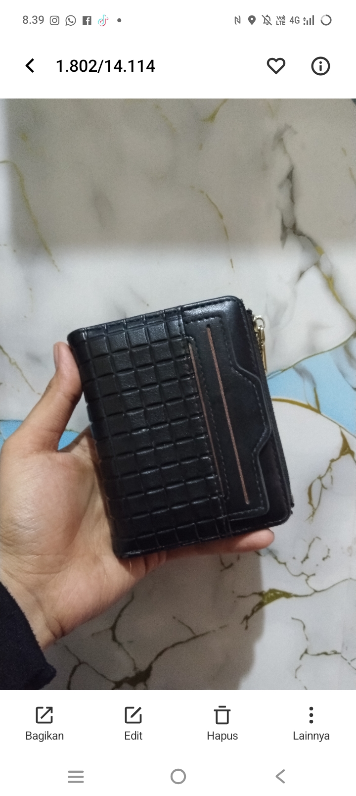 Foto laporan dompet hitam (HB5973)