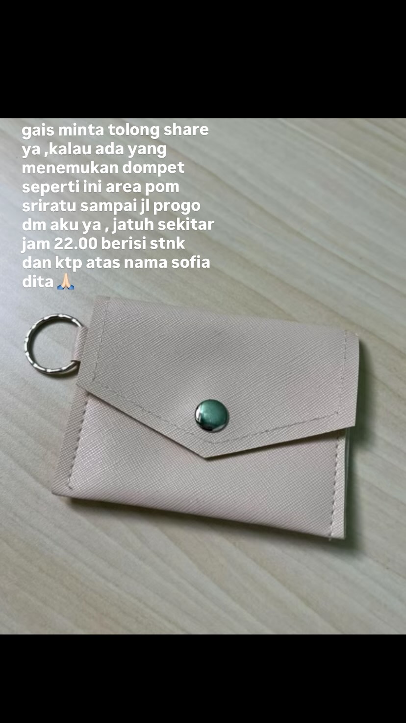 Foto laporan dompet abu-abu (HB6030)