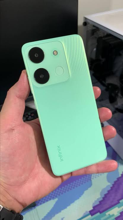 Foto laporan hp infinix warna hijau (HB6305)